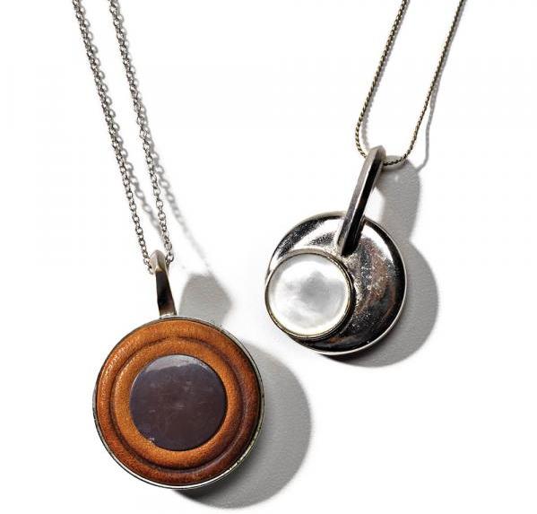 Saxophone keys transformed into pendants, inspired by Fisher’s grandfather (pendant back, left; front, right). $28 each